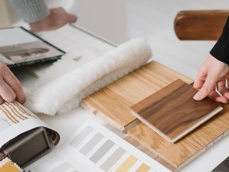 Comparing flooring samples at home